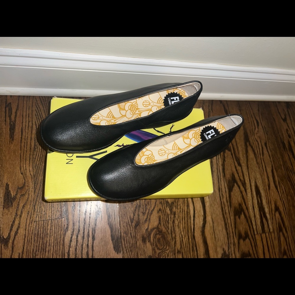 Fly London Black Wedges. Brand new and never been worn. Size 9 US size.